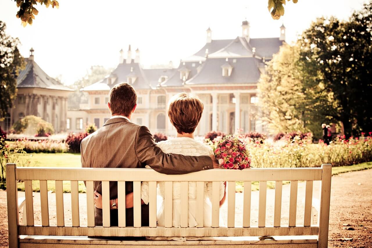 Couple Sitting on Bench